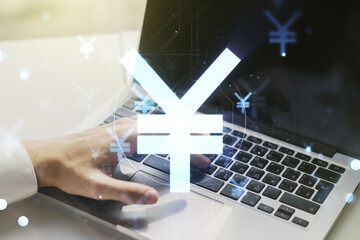 Creative Japanese Yen symbol sketch and hands typing on computer keyboard on background, strategy...