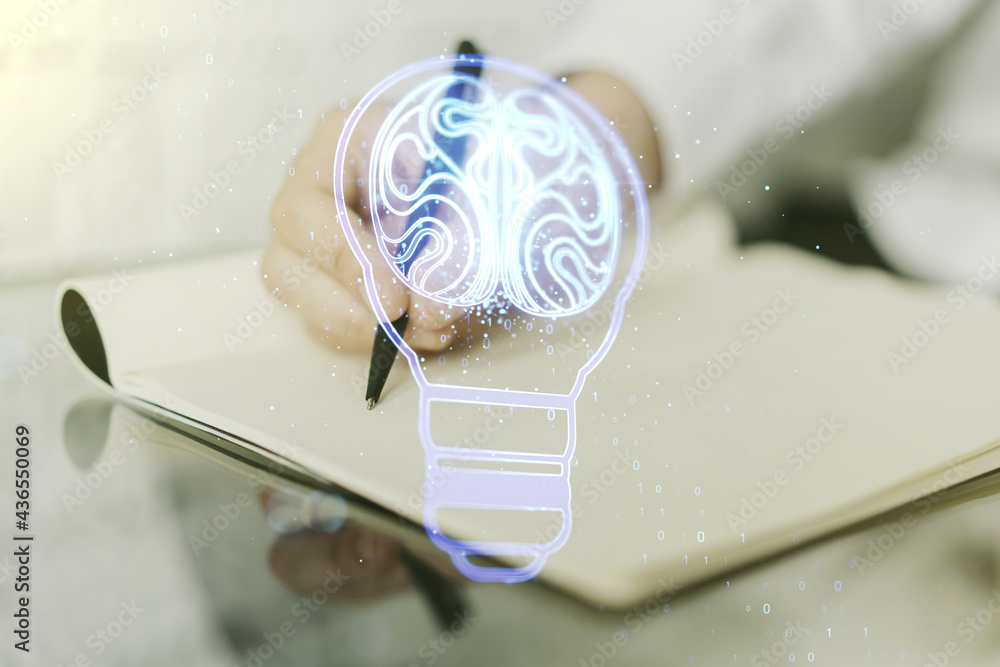 Poster double exposure of creative light bulb hologram with human brain and with man hand writing in notebo