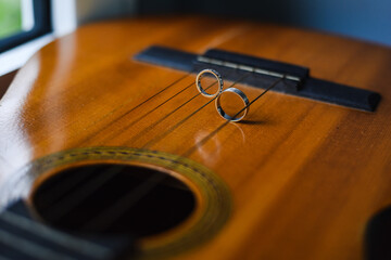 close up of a guitar with rings