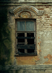Abandoned. A window in an ruined house. Russia.