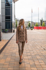 Young blonde business woman outdoor portrait