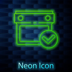 Glowing neon line Calendar with check mark icon isolated on brick wall background. Vector