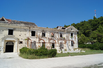 Fototapeta na wymiar Croatia, The Abandoned Hotels of Kupari. Hotel burned and destroyed during the Croatian War of Independence