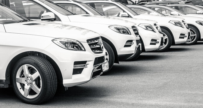 2015: Mercedes Benz white cars parked on the rent a car service