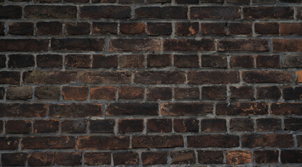 Fototapeta premium dark bricks of different shapes for a background