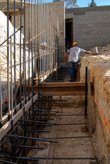 Installing vertical rebar on a new structural footing