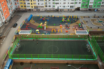 children's playground and sports ground in the courtyard of residential buildings 