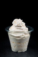 Vanilla ice cream in plastic take away glass
