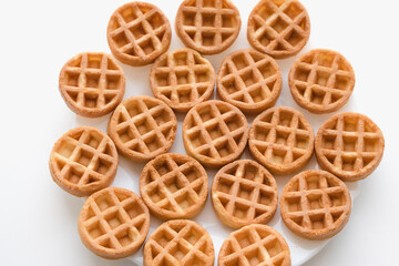 soft waffles on a white background, pastries for tea, pastries