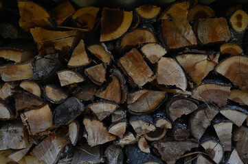 Wooden logs, beams, firewood, frame. Wooden log wooden background texture.