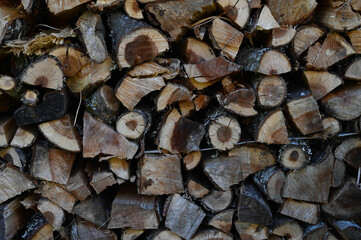 Wooden logs, beams, firewood, frame. Wooden log wooden background texture.