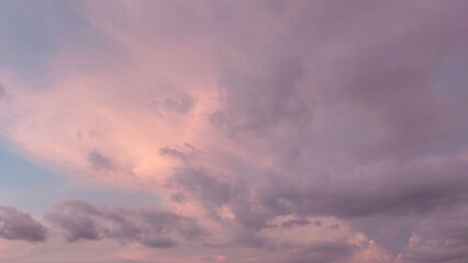 sunset with colorful cloudy sky in twilight time,fluffy cloud before rain