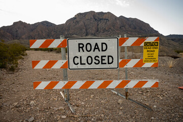 Road Closed Sign On Dirt Road