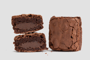 Brownies stuffed with chocolate (brigadier) on white background.