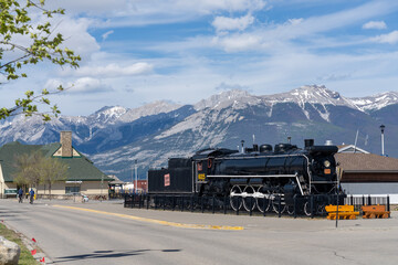 Decoration steam locomotive outside the Jasper train station. Jasper, Alberta, Canada. - obrazy, fototapety, plakaty