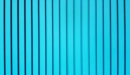 Green pastel line pattern of concrete wall for background. Painted cement column of wallpaper and Exterior design or build structure.