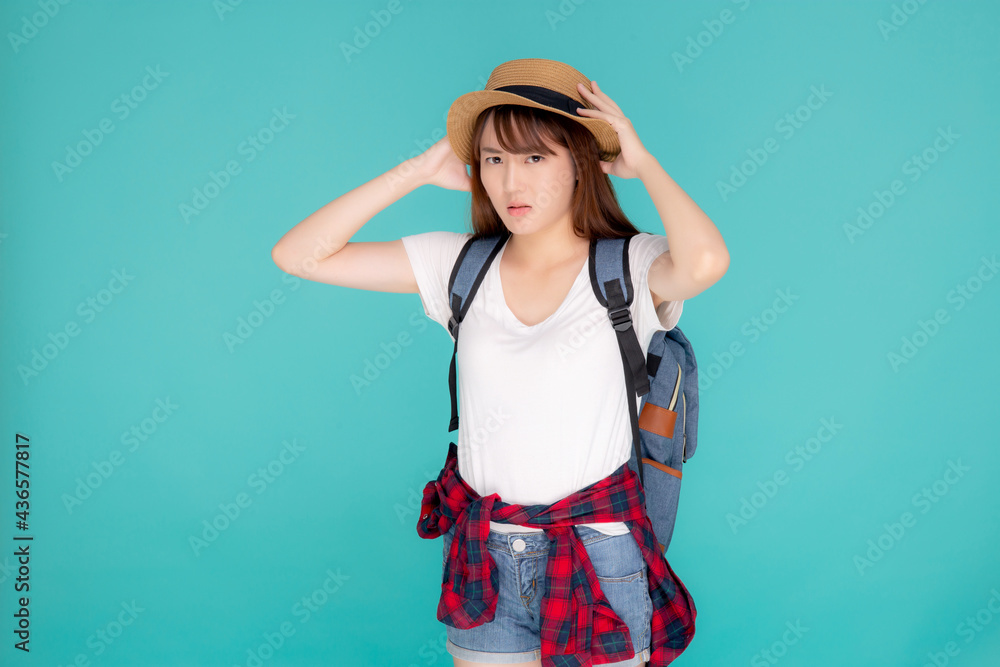 Wall mural beautiful young asian woman upset and worry travel summer trip in abroad isolated on blue background