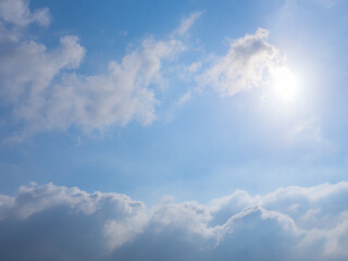 cloudy blue sky with sun light in sunny day