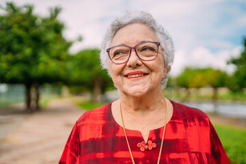Joyful senior lady in glasses laughing. Latin American woman. Brazilian elderly woman.