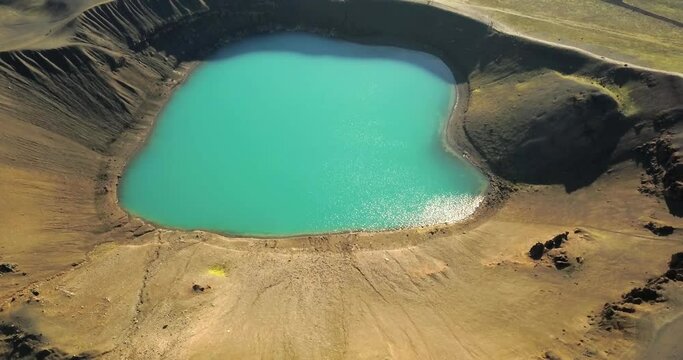 Aerial view of small volcanic Krafla lake with azure water, Iceland
drone view from Iceland, February 2021 
