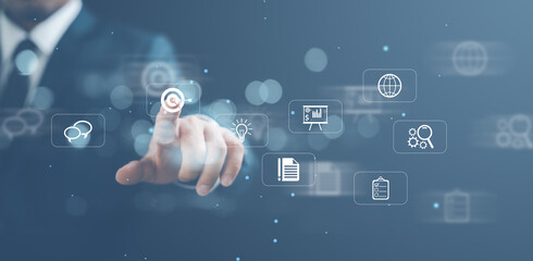 Targeting the business concept, Businessman touching target icon on virtual screen, target in his hand Planning for success, Set goals for better results.