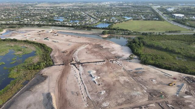 aerial circling South Florida, land development, and installation of infrastructure for a new neighborhood