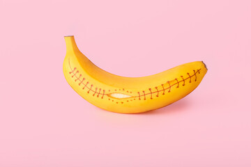 Creative composition with banana on color background