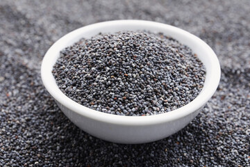 Bowl with poppy seeds, closeup