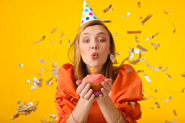 Beautiful woman celebrating birthday on color background - obrazy, fototapety, plakaty