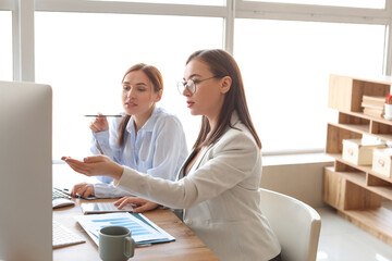 Female accountants working in office