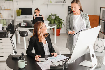 Female accountants working in office