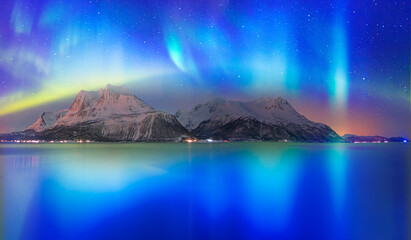 Northern lights or Aurora borealis in the sky over Tromso, Norway