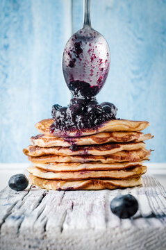 Pancakes with blueberry sauce