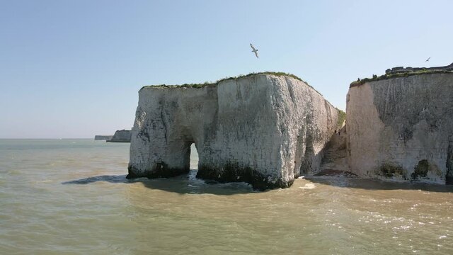 Aerial view of Botany Bay beach with the cliffs on sunny day
