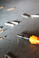 Screwdriver and metal replacement bits