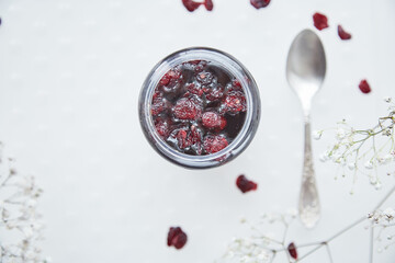 Fermented honey product with cranberry. Healthy, sustainable, lacto-fermentation product with bacteria. Mead on natural yeasts.Healthful food preparing before Christmas. Family recipe traditions