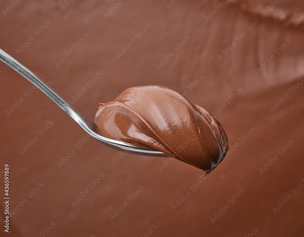 Poster spoon of chocolate hazelnut cream