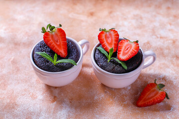 Delicious chocolate souffle with strawberries.