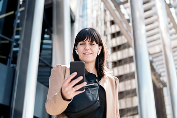 Businesswoman Making a video Call On The Street