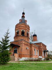 Fototapeta na wymiar The Church of Demetrius of Solunsky (Dmitrov Church) in the spring. Russia, Moscow region, Naro-Fominsky district, Dubrovo village