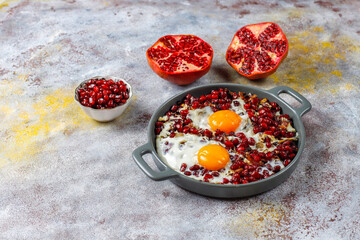 Traditional Azerbaijan cuisine pomegranate seeds with egg narnumru or nar numru.