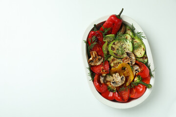 Concept of tasty eating with grilled vegetables on white background