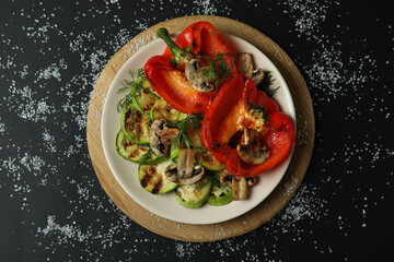 Fototapeta na wymiar Concept of tasty eating with grilled vegetables, top view