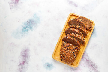 Fresh bread with sunflower seeds, sesame seeds and flax seeds.