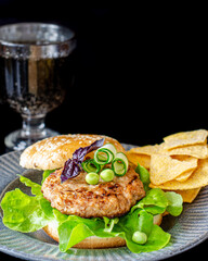 Burgers, hamburgers are delicious buns with cutlet, vegetables and sauce. Fast and tasty food.