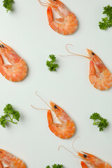 Tasty cooked shrimps on white background, top view