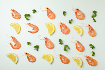 Tasty cooked shrimps on white background, top view