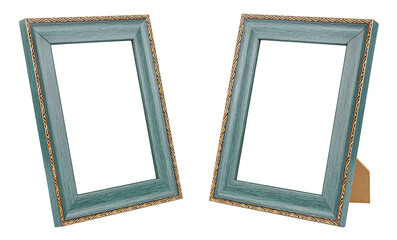 Set of two vertical standing empty large dark green wooden frames for photo or painting with...