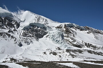 View of  Thorung Peak high 6,144 meters from Thorung La Pass high 5,416 meters. Around Annapurna Trek. Nepal. Asia.