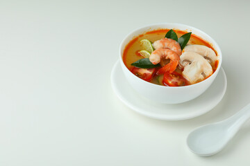 Tasty Tom yum soup on white background